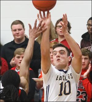 Toledo Christian's Landon McGill, pictured in a game earlier this season, hit a game-winning 3-pointer Friday against Ottawa Hills.