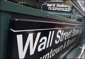 This Oct. 2, 2014, file photo shows the Wall Street subway stop on Broadway in New York's Financial District.