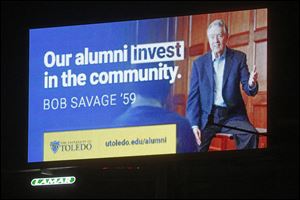 An electronic billboard featuring University of Toledo alumnus Bob Savage is on Glendale Avenue near Byrne Road in South Toledo. 