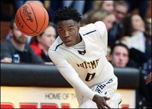 Whitmer's Areon Evans, shown in a game last season, scored 10 points Friday to help the Panthers beat City League champion Start for a sectional title.