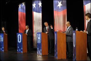From left: former Cleveland congressman Dennis Kucinich, former Ohio Supreme Court Justice William O’Neill, moderator and WTOL-TV anchor Jerry Anderson, state Sen. Joe Schiavoni (D., Boardman), and former federal consumer watchdog Richard Cordray take turns speaking during the fourth Democratic primary debate Wednesday, March 7, 2018, at Bowsher High School in Toledo. 