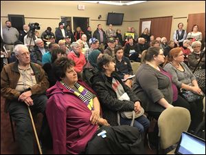 A crowd of about 50 Toledoans gathered at the Locke Branch Library in East Toledo on Wednesday, March 7, 2018 to ask questions of Mayor Wade Kapszukiewicz and his staff.