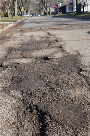 Many residents at the Wednesdays with Wade event April 4 complained about the city's persistent pothole problem.