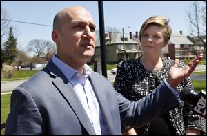 Governor's candidate Joe Schiavoni, left, and state Board of Education member Stephanie Dodd, right, talk about the ECOT whistleblower and call for a criminal investigation of ECOT sponsor ESC Lake Erie West during a press conference at Educational Service Center on April 30, 2018.