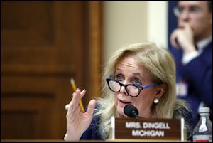 Rep. Debbie Dingell, D-Mich., questions Environmental Protection Agency Administrator Scott Pruitt as he testifies on the EPA's budget Thursday, April 26, 2018 in Washington.