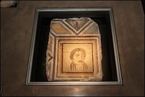 Bowling Green State University officials have signed an agreement to return several ancient mosaics to Turkey after researchers determined the art was illegally excavated decades ago.