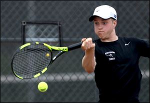 Perrysburg's Ben Weider, shown during the Northern Lakes League tennis tournament, won a district singles championship Saturday.