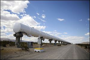 The 500-meter Devloop, or Development loop, essentially a test tube for the Virgin Hyperloop One pod, stretches out along a wide gravel road at the testing facility in Apex, Nev. 