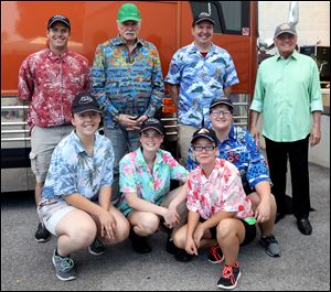 Two of the Beach Boys pose with Penta students and instructors: (top, from left) Austin Halterman, a culinary arts instructional aide with Penta, Mike Love of the Beach Boys, chef Jim Rhegness, Bruce Johnston of the Beach Boys, (bottom, from left) Angela Elliott, Brie Plotner, Lexus Perkins, and Beccah Cowell. 