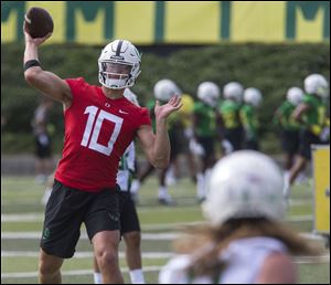 According to many talent evaluators, quarterback Justin Herbert could be a top 10 pick in the NFL draft if he leaves Oregon after this season.