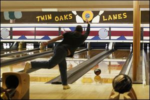Todd Rowland tries to pick up a last pin while bowling with the Kenny Mummert Memorial League Monday, April 24, 2017, at Twin Oaks Lanes in North Toledo. 