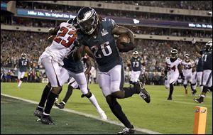 Philadelphia Eagles' Jay Ajayi scores a touchdown against the Atlanta Falcons.