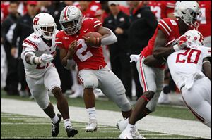 Ohio State quarterback Dwayne Haskins drops back to pass against Rutgers.