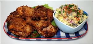 Fried Chicken with Pickle and Potato Salad. 