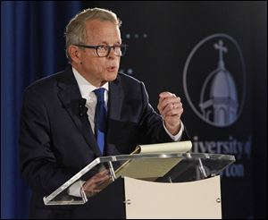 Gubernatorial candidate Republican Mike DeWine speaks during a debate with his opponent Democrat Richard Cordray at the University of Dayton.