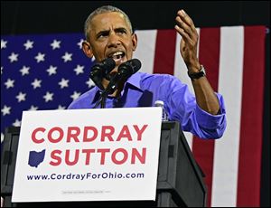 Former President Barack Obama speaks as he campaigns in support of Ohio gubernatorial candidate Richard Cordray in Cleveland. 