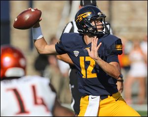 Toledo quarterback Eli Peters threw for three touchdowns against  Bowling Green on Saturday at the Glass Bowl.