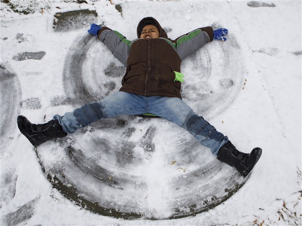 GALLERY Snow Brings Stress For Some Fun For Others In Toledo The Blade