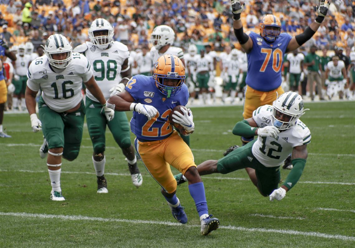 Pittsburgh running back Vincent Davis (22) breaks away from Ohio safety Jarren Hampton (12) to score a touchdown during the Panthers' win Saturday at Heinz Field.