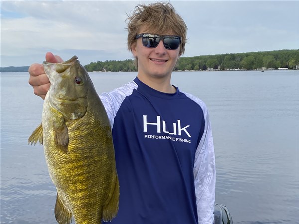 Outdoors Young Angler Calculates Mastering Bass Fishing The Blade