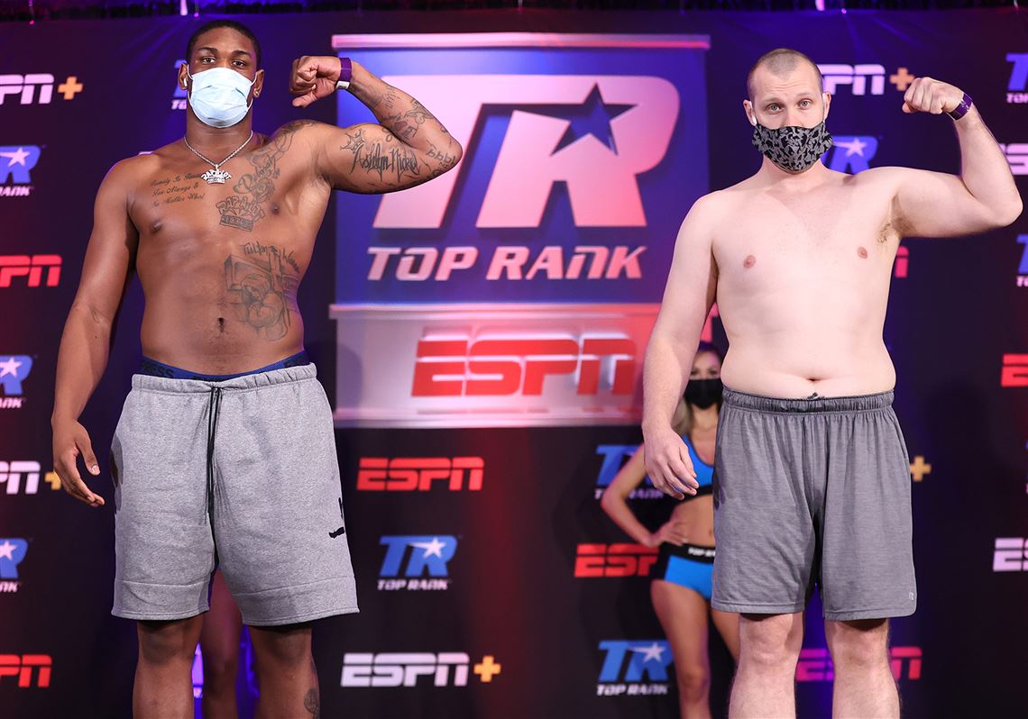 Jared Anderson, left, and Jeremiah Karpency pose during their weigh-in at the Osage Casino on Friday in Tulsa, Okla.