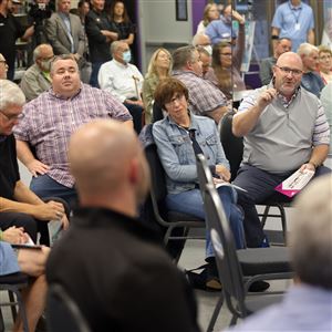 Mike McMahon, operations manager for Sylvania Recreation, back right, responds to a question during a public forum at the YMCA/JCC facility in Sylvania on Oct. 6, 2021. 