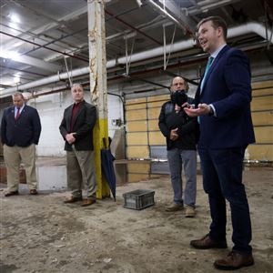 David Mann, President and CEO of the Land Bank, talks about the renovation of the former P & J Industries property on the corner of Lewis and Laskey in west Toledo on Oct. 25, 2021.
