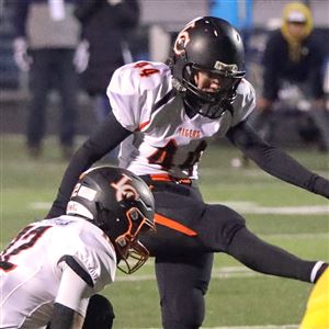 Liberty Centeru2019s Carly Roth kicks the game-winning field goal during the OHSAA Division VI regional semifinal high school football playoff game between Archbold and Liberty Center at Defiance High School in Defiance on Saturday, Nov. 13, 2021. THE BLADE/KURT STEISS