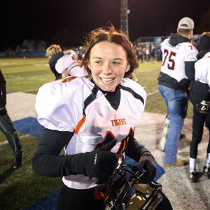 Liberty Centeru2019s Carly Roth gives a thumbs up in celebration after kicking the game-winning field goal in the OHSAA Division VI regional semifinal high school football playoff game between Archbold and Liberty Center at Defiance High School in Defiance on Nov. 13, 2021. 