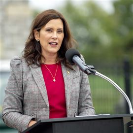 Michigan Gov. Gretchen Whitmer announces the first round of Michigan Mobility Funding Platform grants on Sept. 15, 2021, at the GM Mobility Research Center at Kettering University in Flint, Mich.