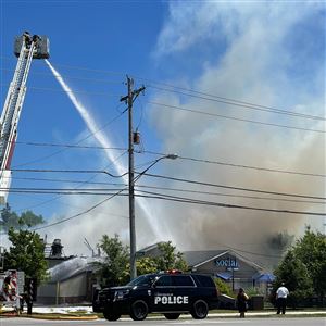 Firefighters put out the fire at Social Gastropub in Perrysburg on June 23.