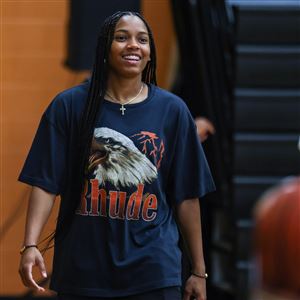 Zia Cooke participates at Elite Basketball Camp at Lourdes University's Russell J. Ebeid Recreation Center in Sylvania on Saturday. (THE BLADE / REBECCA BENSON)