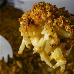 Rich, cheesy, crumb-topped Funeral Potatoes are a ubiquitous dish at post-service meals, particularly among members of the Church of Jesus Christ of Latter-day Saints. (The recipe is often called Mormon Funeral Potatoes.)  (THE BLADE/JEREMY WADSWORTH)