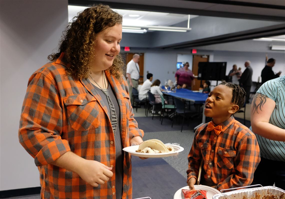 Ohio couple celebrates adopting 2 Lucas