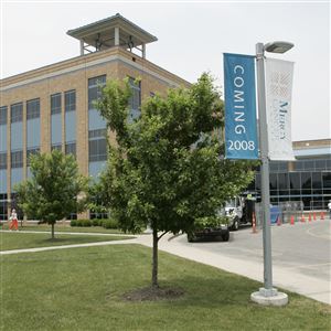 The first two floors of the building at left house the Mercy Cancer Center at St. Anne Hospital in Toledo, in 2008. 