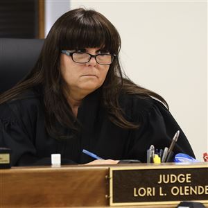 Judge Lori L. Olender listens during opening statements  during a murder trial for Antwuan Lawson, Jan. 31, at the Lucas County Courthouse in Toledo.