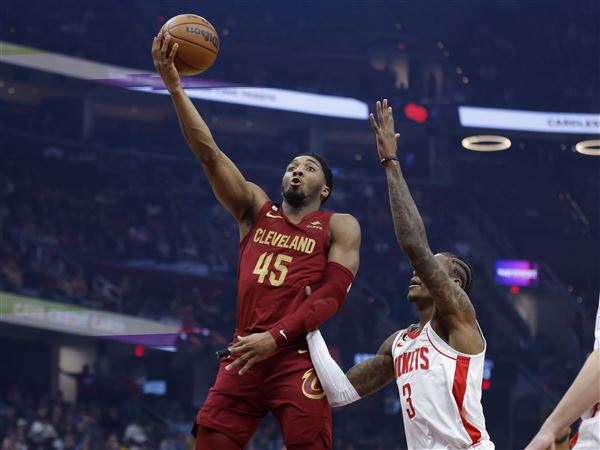 Cavaliers clinch playoff spot with win over Rockets