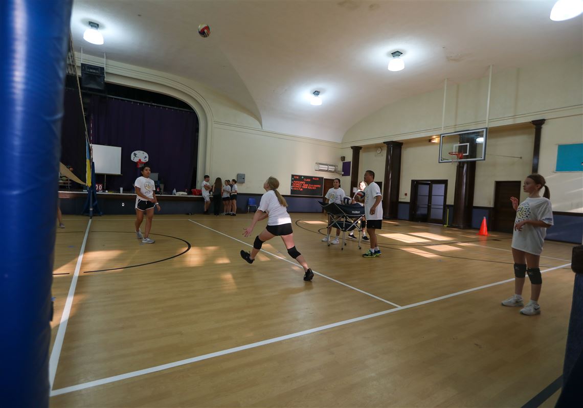 Local doctor creates community for Ukrainian girls through volleyball | The  Blade