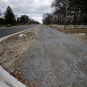 Part of a multipurpose trail parallel to Anthony Wayne Trail and Copland Boulevard along the Toledo Country Club golf course in South Toledo. The photo was take in March of 2023.  (THE BLADE/KURT STEISS)