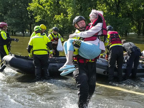 Heavy rains over Texas have led to water rescues and evacuation orders