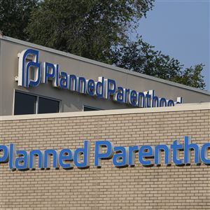 A Planned Parenthood sign is displayed on the outside of the clinic, Aug. 1, 2023, in Indianapolis.