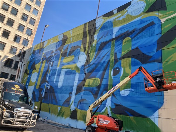 Vision and purpose: Community focus continues to define muralist's ...
