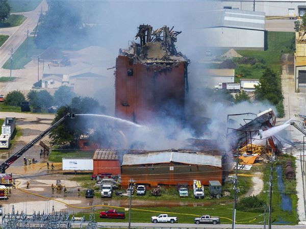 Nebraska plant explosion killed 2 girls and an employee, with fire still burning