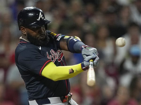 Ozuna z žrtvovalno muho v 10. inningu zagotovil zmago Braves nad Reds s 12:11