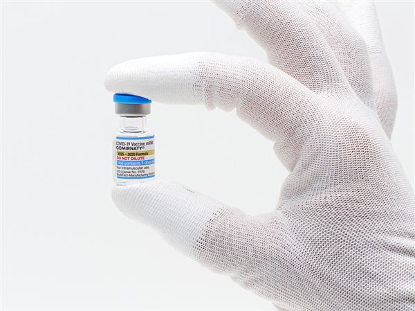 FDA approves updated COVID-19 shots with limits