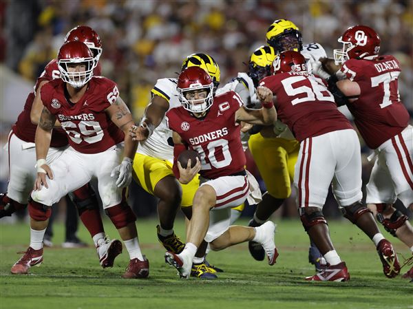 John Mateer has 2 TDs rushing, 1 passing as No. 18 Oklahoma beats No. 15 Michigan 24-13