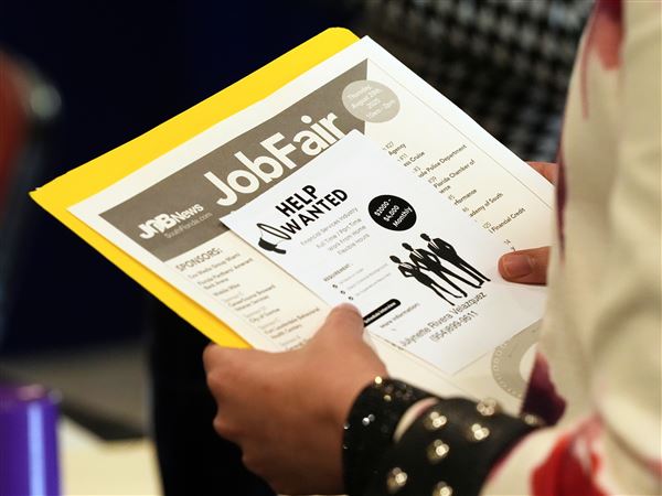 Number of Americans filing for jobless benefits last week hits 263,000, most in nearly 4 years
