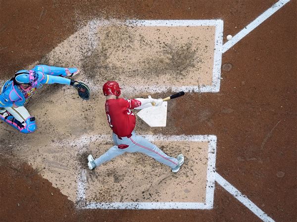 Reds overtake Mets for NL's 3rd wild-card spot by beating Brewers 3-1