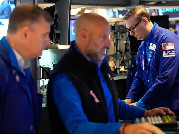 Wall Street sets more records, but bond yields drop following discouraging data on the job market