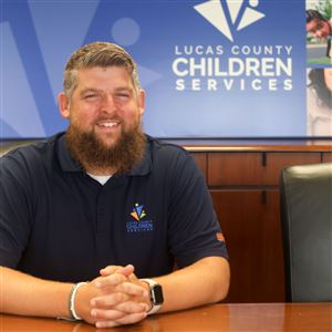Jeffrey Chesser, a Lucas County Children Services independent living youth advocate, who was named the child protection support advocate of the year on Oct. 3 in Columbus, is shown on Oct. 15 at LCCS in Toledo.
